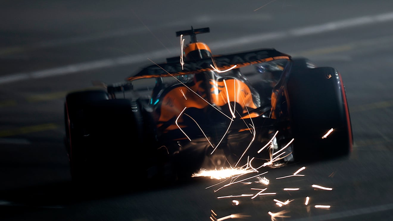 LAS VEGAS, NEVADA - NOVEMBER 22: Sparks fly behind Oscar Piastri of Australia driving the (81) McLaren MCL38 Mercedes during qualifying ahead of the F1 Grand Prix of Las Vegas at Las Vegas Strip Circuit on November 22, 2024 in Las Vegas, Nevada. (Photo by Chris Graythen/Getty Images)