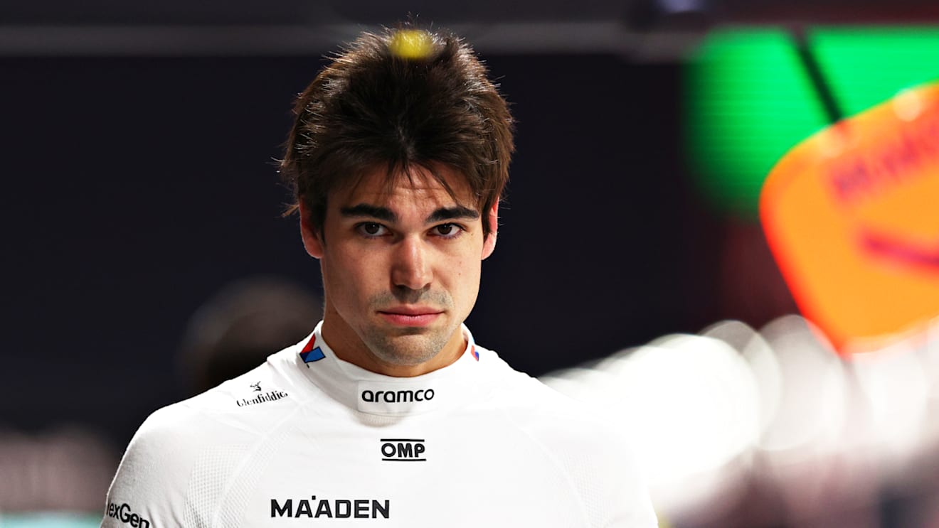 LAS VEGAS, NEVADA - NOVEMBER 22: 20th placed qualifier Lance Stroll of Canada and Aston Martin F1 Team walks in the Pitlane during qualifying ahead of the F1 Grand Prix of Las Vegas at Las Vegas Strip Circuit on November 22, 2024 in Las Vegas, Nevada. (Photo by Clive Rose - Formula 1/Formula 1 via Getty Images)