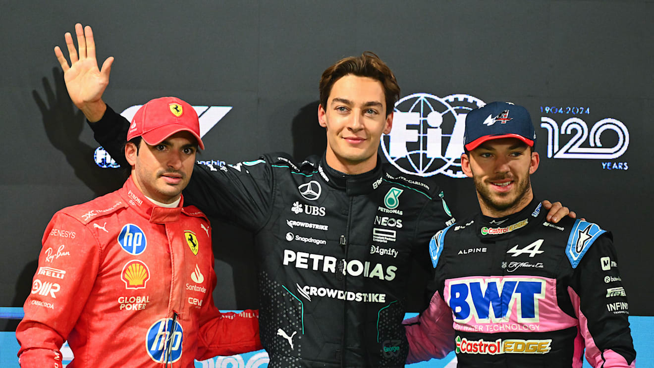 LAS VEGAS, NEVADA - NOVEMBER 22: Pole position qualifier George Russell of Great Britain and Mercedes (C), Second placed qualifier Carlos Sainz of Spain and Ferrari (L) and Third placed qualifier Pierre Gasly of France and Alpine F1 (R) pose for a photo in parc ferme during qualifying ahead of the F1 Grand Prix of Las Vegas at Las Vegas Strip Circuit on November 22, 2024 in Las Vegas, Nevada. (Photo by Mark Sutton - Formula 1/Formula 1 via Getty Images)