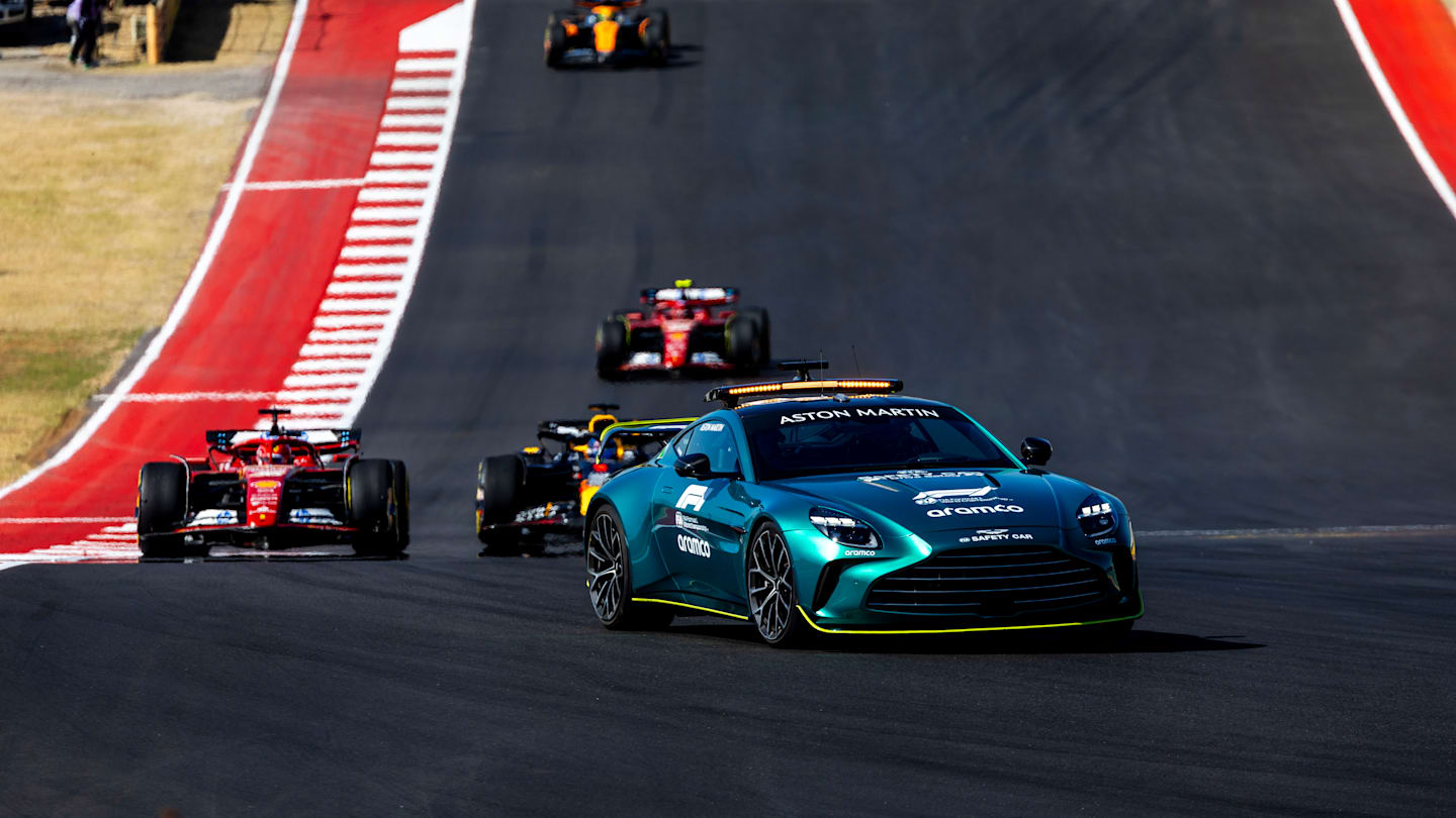 The Aston Martin Vantage Safety Car leads Charles Leclerc, Ferrari SF-24, Max Verstappen, Red Bull