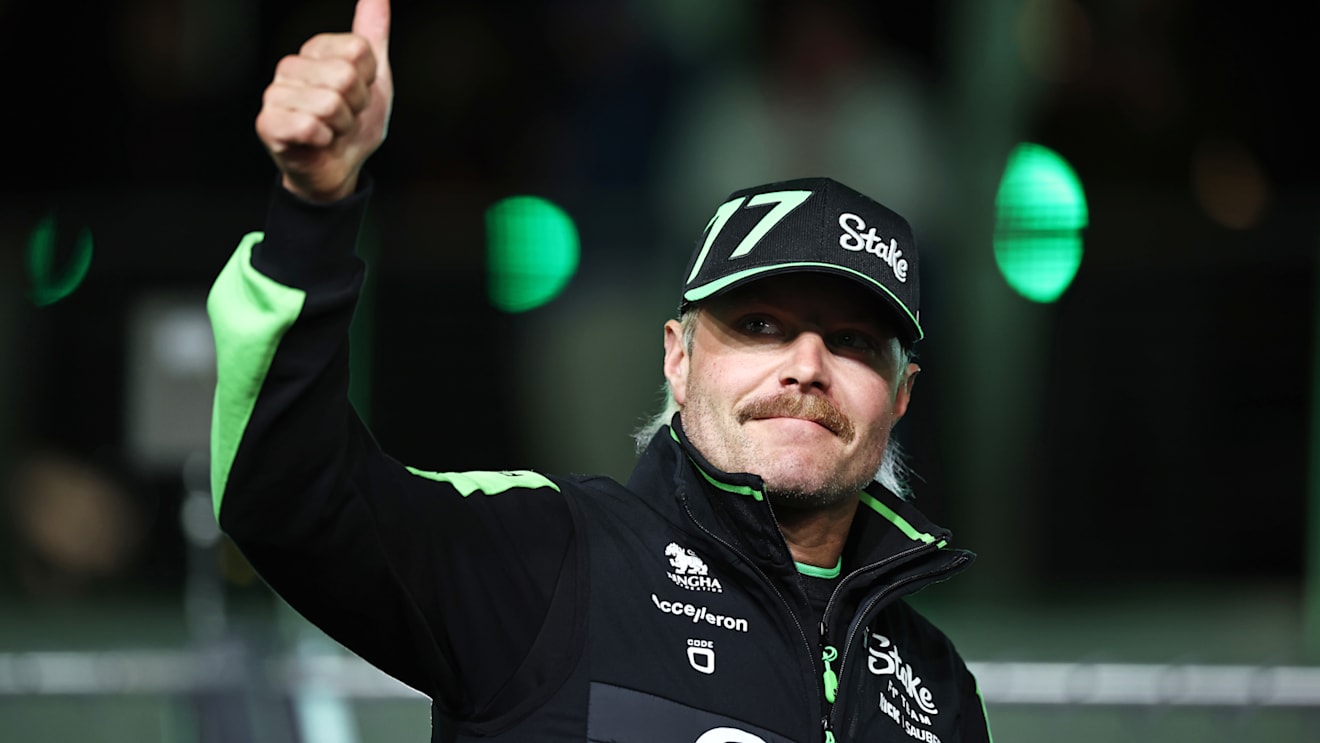 LAS VEGAS, NEVADA - NOVEMBER 23: Valtteri Bottas of Finland and Stake F1 Team Kick Sauber acknowledges the crowd on the drivers parade prior to the F1 Grand Prix of Las Vegas at Las Vegas Strip Circuit on November 23, 2024 in Las Vegas, Nevada. (Photo by Jared C. Tilton - Formula 1/Formula 1 via Getty Images)