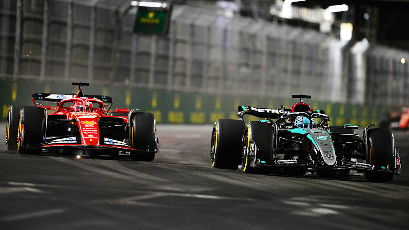 LAS VEGAS, NEVADA - NOVEMBER 23: George Russell of Great Britain driving the (63) Mercedes AMG Petronas F1 Team W15 leads Charles Leclerc of Monaco driving the (16) Ferrari SF-24 during the F1 Grand Prix of Las Vegas at Las Vegas Strip Circuit on November 23, 2024 in Las Vegas, Nevada. (Photo by Rudy Carezzevoli/Getty Images)