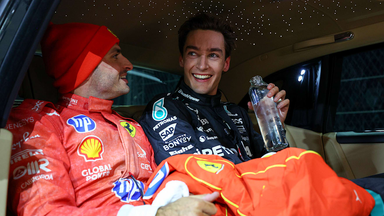 LAS VEGAS, NEVADA - NOVEMBER 23: Race winner George Russell of Great Britain and Mercedes and Third placed Carlos Sainz of Spain and Ferrari celebrate in parc ferme during the F1 Grand Prix of Las Vegas at Las Vegas Strip Circuit on November 23, 2024 in Las Vegas, Nevada. (Photo by Clive Rose - Formula 1/Formula 1 via Getty Images)