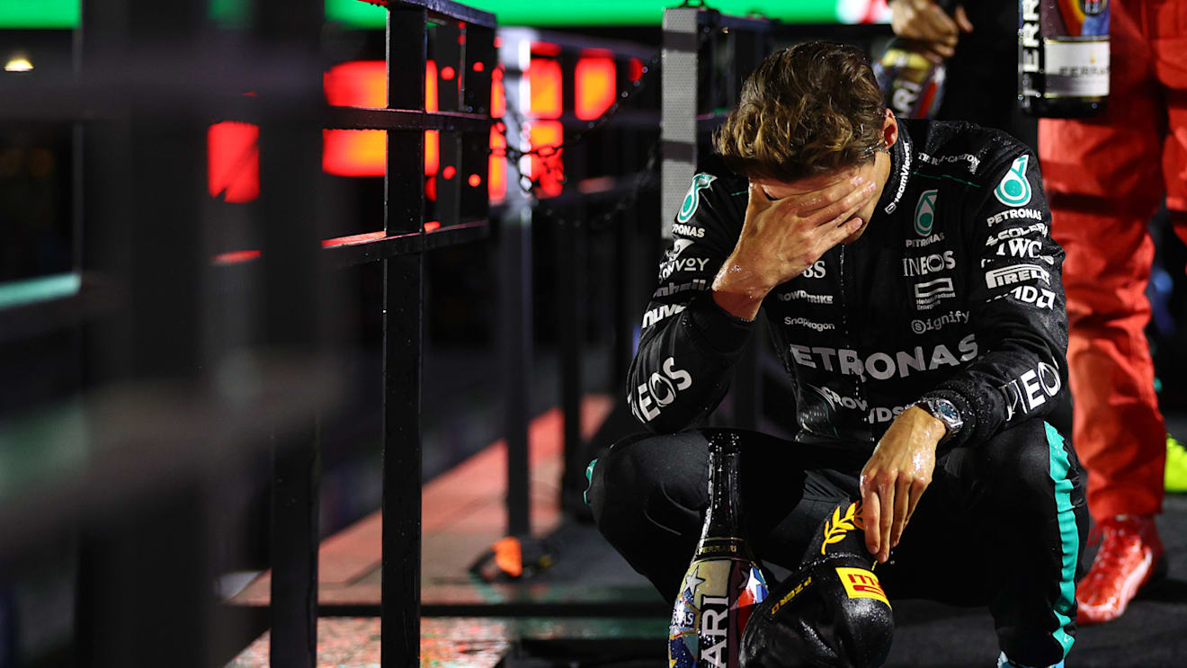 LAS VEGAS, NEVADA - NOVEMBER 23: Race winner George Russell of Great Britain and Mercedes reacts on the podium during the F1 Grand Prix of Las Vegas at Las Vegas Strip Circuit on November 23, 2024 in Las Vegas, Nevada. (Photo by Clive Rose - Formula 1/Formula 1 via Getty Images)