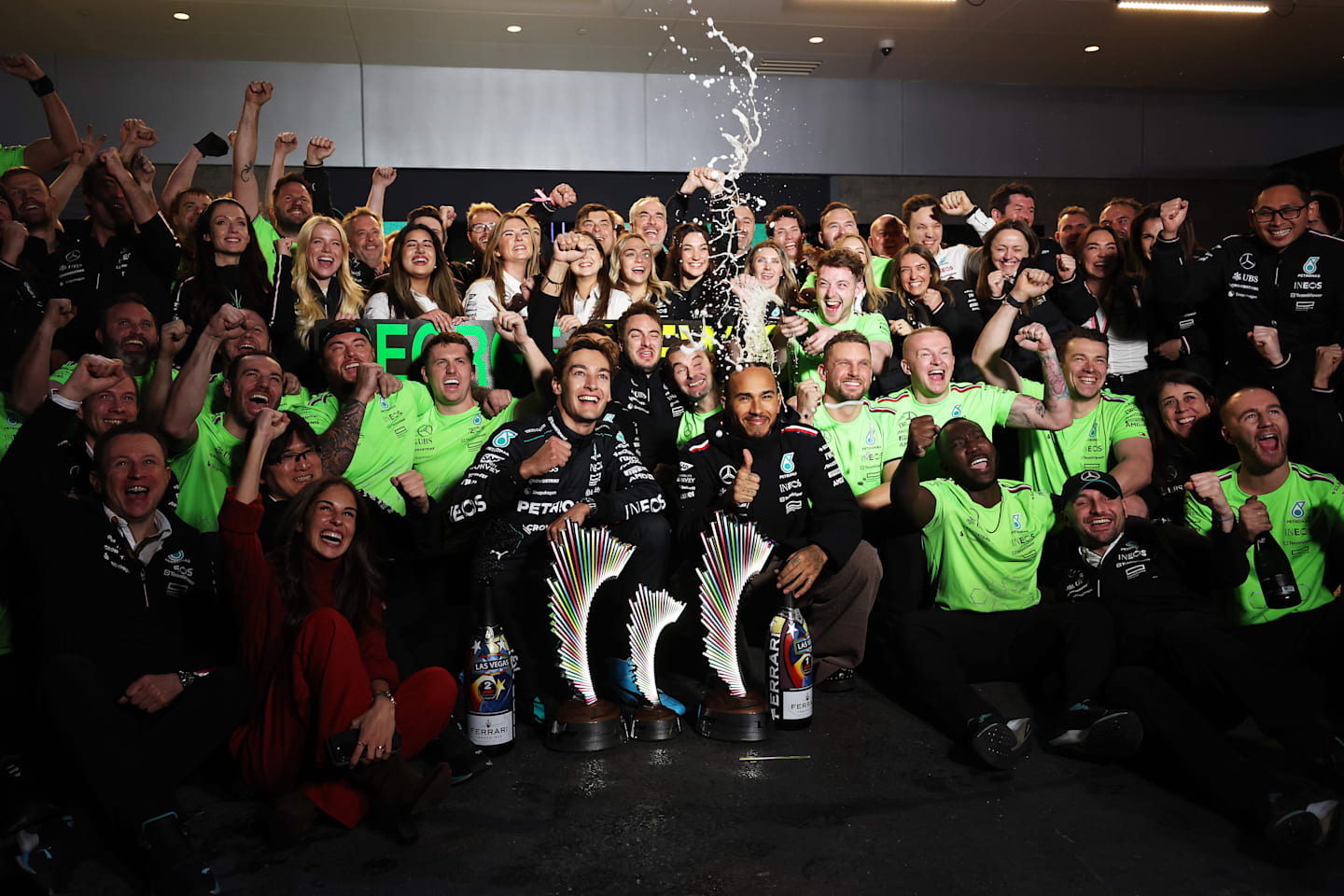 LAS VEGAS, NEVADA - NOVEMBER 23: Race winner George Russell and Lewis Hamilton celebrate in the Pitlane after the F1 Grand Prix of Las Vegas on November 23, 2024 in Las Vegas, Nevada. (Photo by Meg Oliphant - Formula 1/Formula 1 via Getty Images)