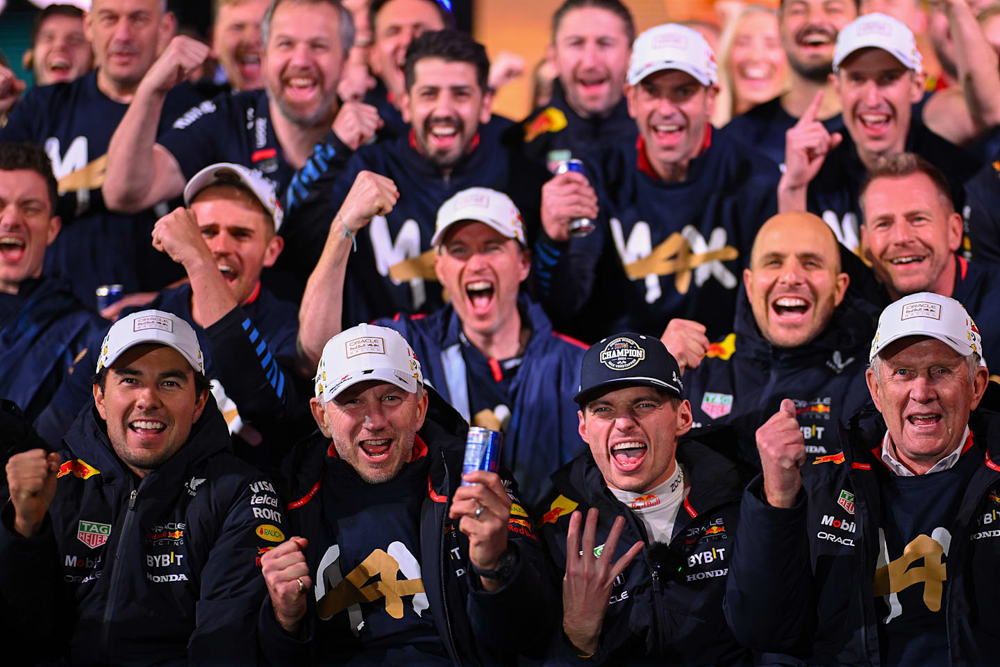 2024 F1 World Drivers Champion Max Verstappen celebrates alongside Sergio Perez, Oracle Red Bull Racing Team Principal Christian Horner and Dr Helmut Marko after the F1 Grand Prix of Las Vegas on November 23, 2024. (Photo by Clive Mason/Getty Images)