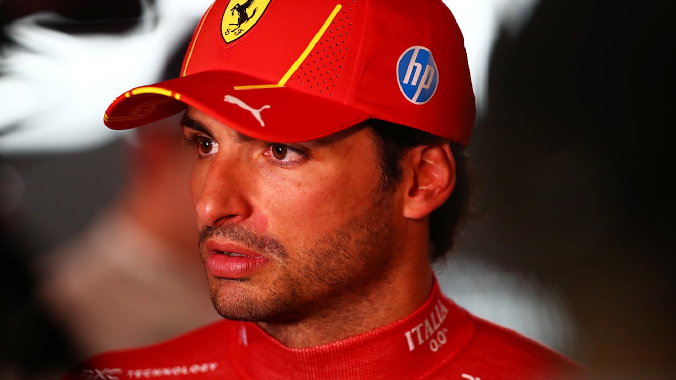 LUSAIL CITY, QATAR - NOVEMBER 30: 4th placed Carlos Sainz of Spain and Ferrari talks to the media in the Paddock after the Sprint ahead of the F1 Grand Prix of Qatar at Lusail International Circuit on November 30, 2024 in Lusail City, Qatar. (Photo by Peter Fox/Getty Images)