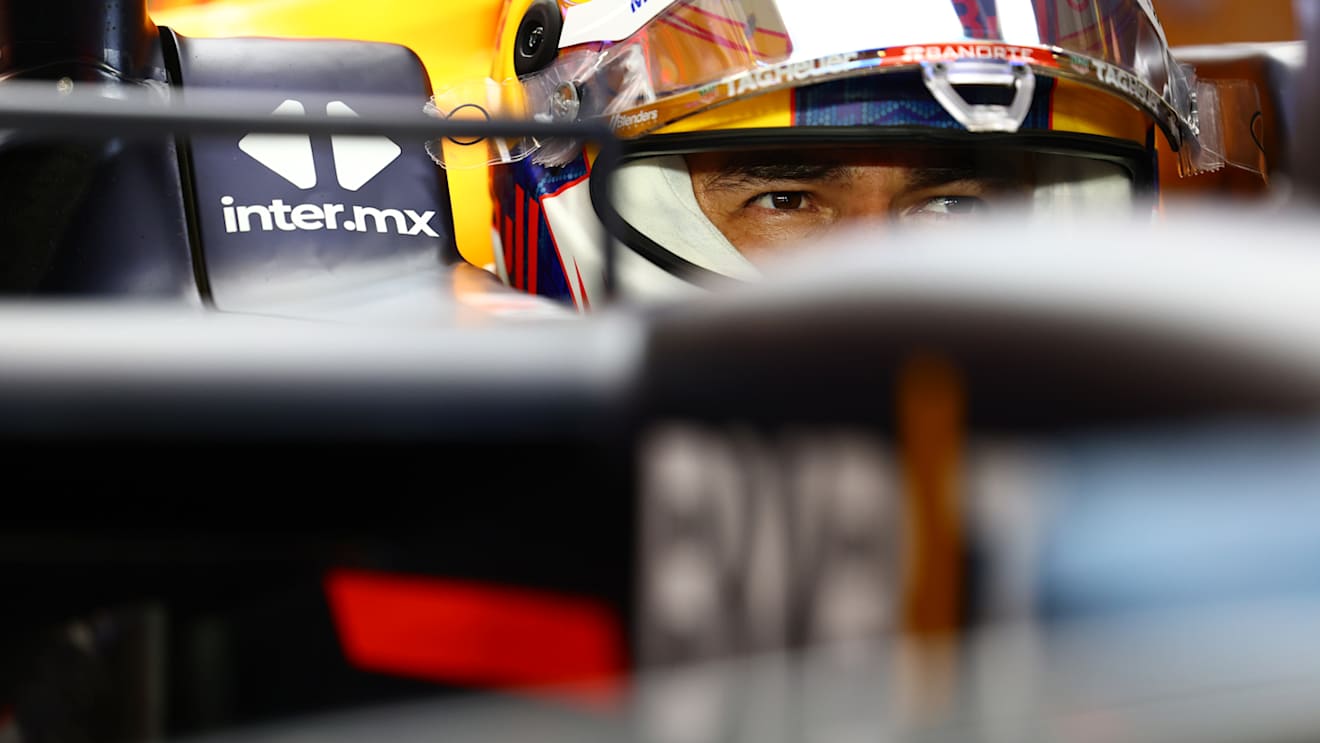 LUSAIL CITY, QATAR - NOVEMBER 30: Sergio Perez of Mexico and Oracle Red Bull Racing prepares to drive in the garage during qualifying ahead of the F1 Grand Prix of Qatar at Lusail International Circuit on November 30, 2024 in Lusail City, Qatar. (Photo by Mark Thompson/Getty Images)