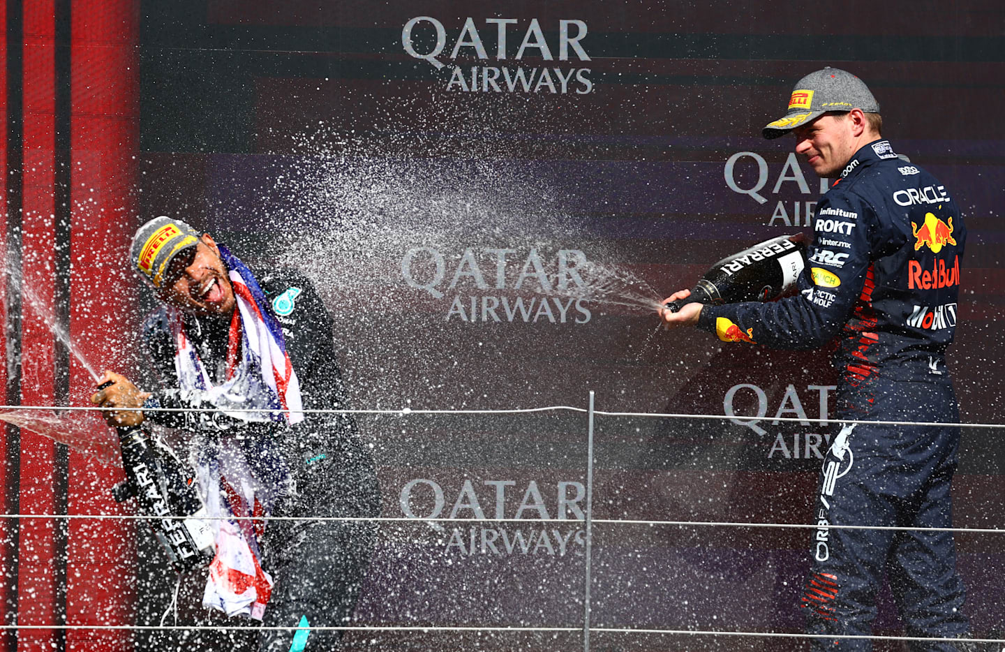 NORTHAMPTON, ENGLAND - JULY 07: Race winner Lewis Hamilton of Great Britain and Mercedes and Second