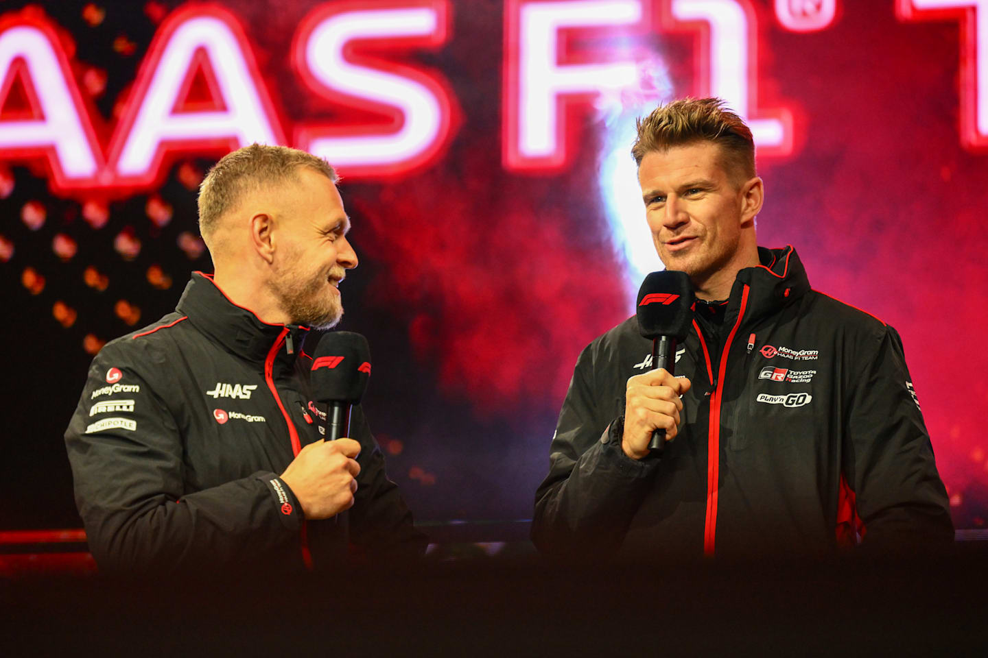 Kevin Magnussen, Haas F1 Team, and Nico Hulkenberg, Haas F1 Team, on stage during the Las Vegas GP at Streets of Las Vegas on Friday November 22, 2024, United States of America. (Photo by Simon Galloway / LAT Images)