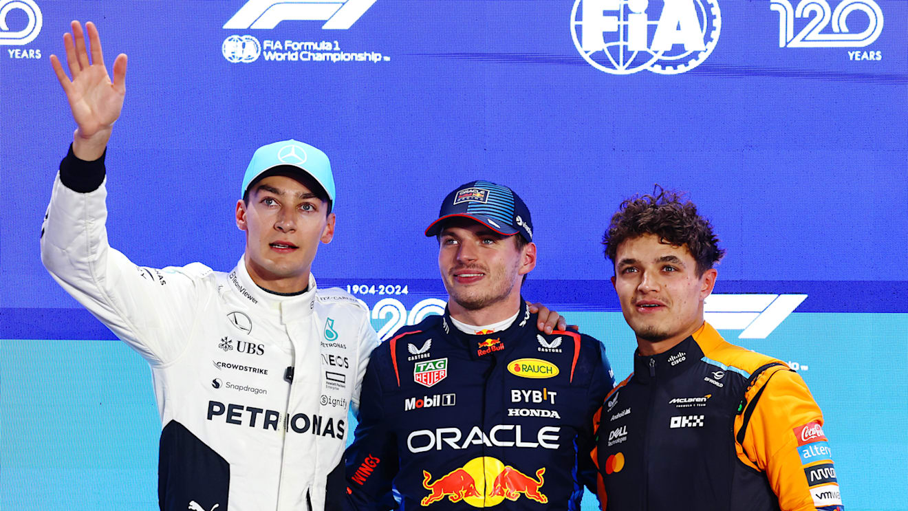 LUSAIL CITY, QATAR - NOVEMBER 30: Pole position qualifier Max Verstappen of the Netherlands and Oracle Red Bull Racing, Second placed qualifier George Russell of Great Britain and Mercedes and Third placed Lando Norris of Great Britain and McLaren pose for a photo in parc ferme during qualifying ahead of the F1 Grand Prix of Qatar at Lusail International Circuit on November 30, 2024 in Lusail City, Qatar. (Photo by Mark Thompson/Getty Images)