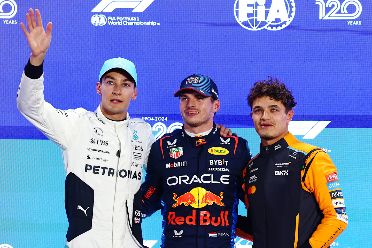 Pole position qualifier Max Verstappen, Second placed qualifier George Russell and Third placed Lando Norris in parc ferme during qualifying ahead of the F1 Grand Prix of Qatar on November 30, 2024. (Photo by Mark Thompson/Getty Images)