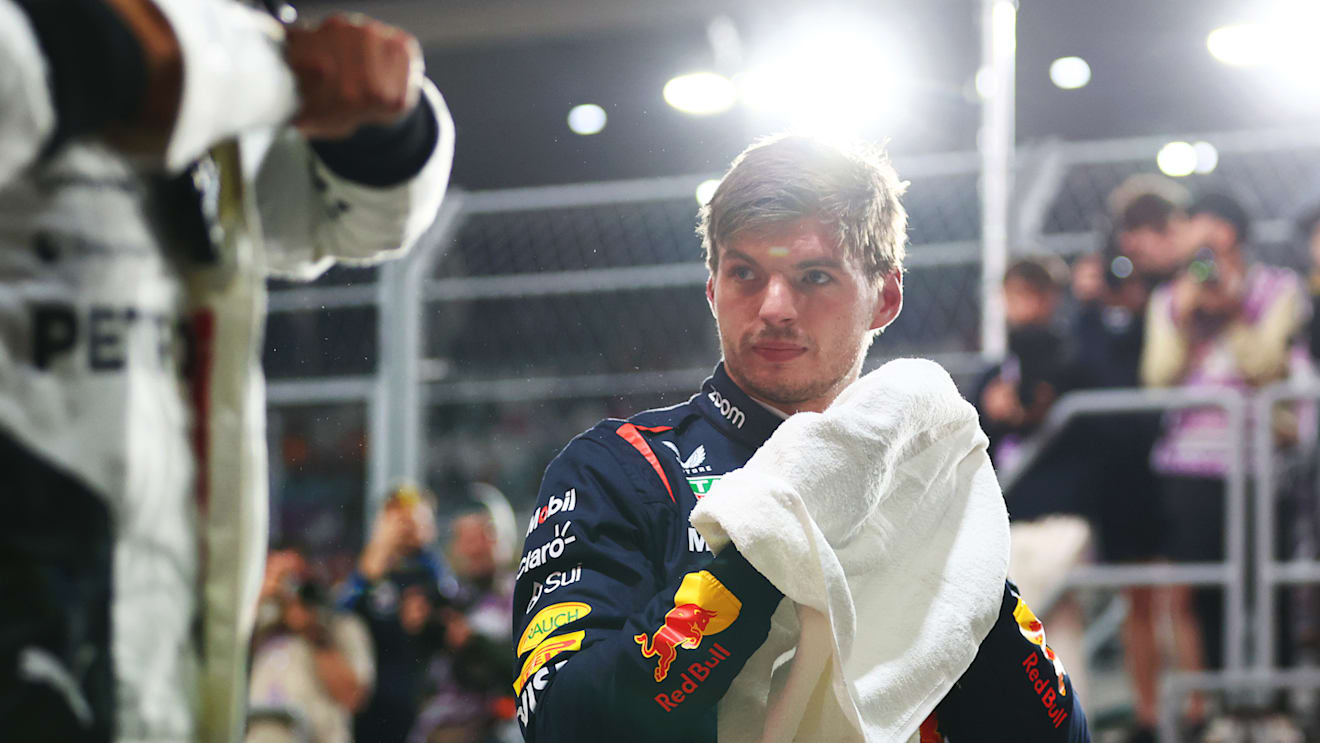 LUSAIL CITY, QATAR - NOVEMBER 30: Pole position qualifier Max Verstappen of the Netherlands and Oracle Red Bull Racing looks on in parc ferme during qualifying ahead of the F1 Grand Prix of Qatar at Lusail International Circuit on November 30, 2024 in Lusail City, Qatar. (Photo by Bryn Lennon - Formula 1/Formula 1 via Getty Images)