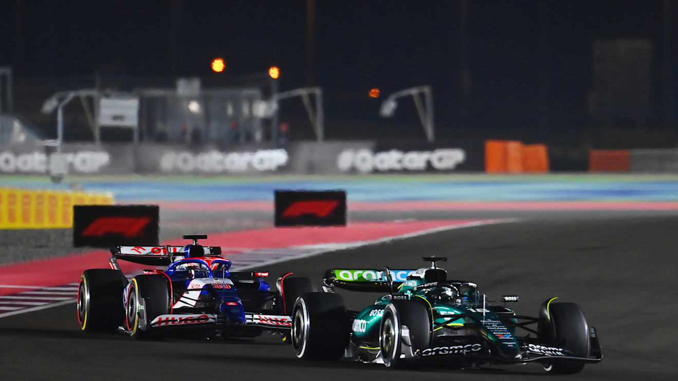 LUSAIL CITY, QATAR - DECEMBER 01: Lance Stroll of Canada driving the (18) Aston Martin AMR24 Mercedes leads Liam Lawson of New Zealand driving the (30) Visa Cash App RB VCARB 01 on track during the F1 Grand Prix of Qatar at Lusail International Circuit on December 01, 2024 in Lusail City, Qatar. (Photo by James Sutton - Formula 1/Formula 1 via Getty Images)