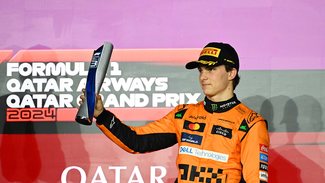 LUSAIL CITY, QATAR - DECEMBER 01: Third placed Oscar Piastri of Australia and McLaren celebrates on the podium during the F1 Grand Prix of Qatar at Lusail International Circuit on December 01, 2024 in Lusail City, Qatar. (Photo by Mark Sutton - Formula 1/Formula 1 via Getty Images)