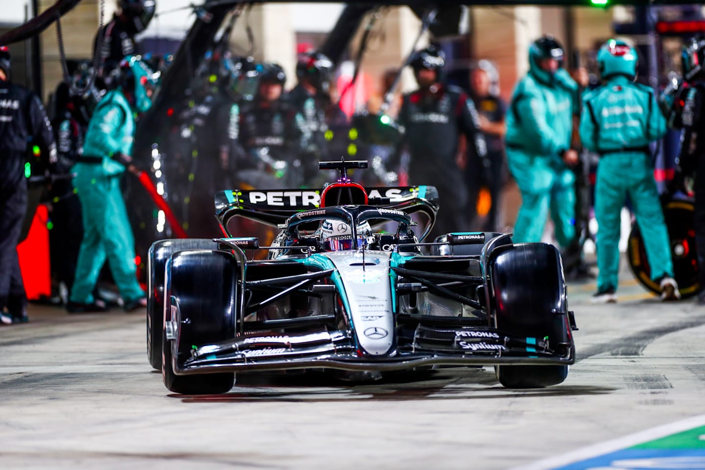 LUSAIL CITY, QATAR - DECEMBER 01: George Russell of Mercedes and Great Britain makes a pitstop