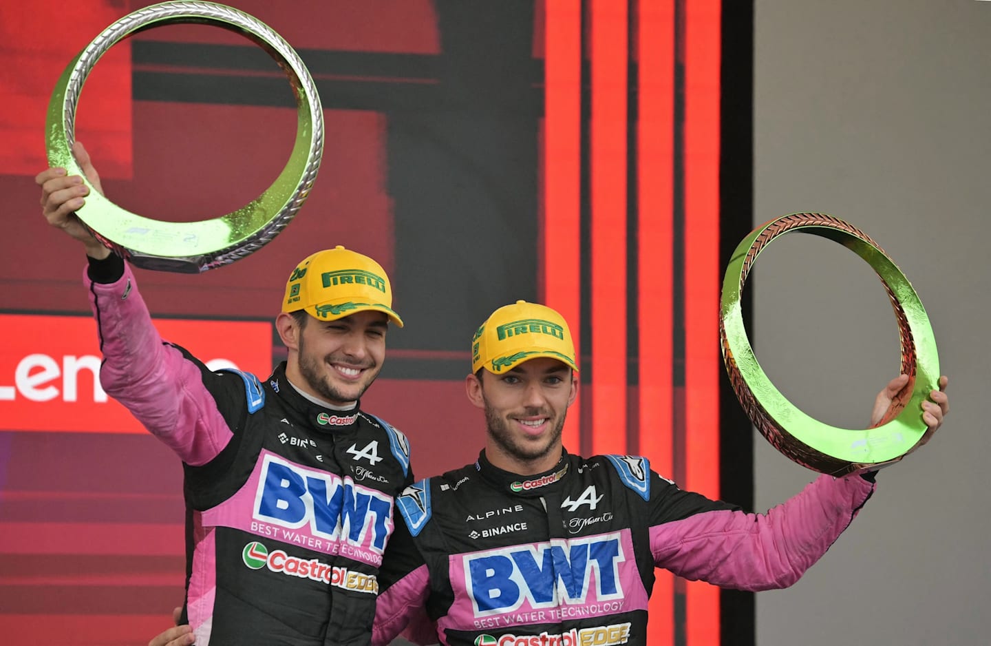 Esteban Ocon and Pierre Gasly celebrate at the podium in the Formula One Sao Paulo Grand Prix, at the Jose Carlos Pace racetrack, aka Interlagos, in Sao Paulo, Brazil, on November 3, 2024. (Photo by NELSON ALMEIDA / AFP)