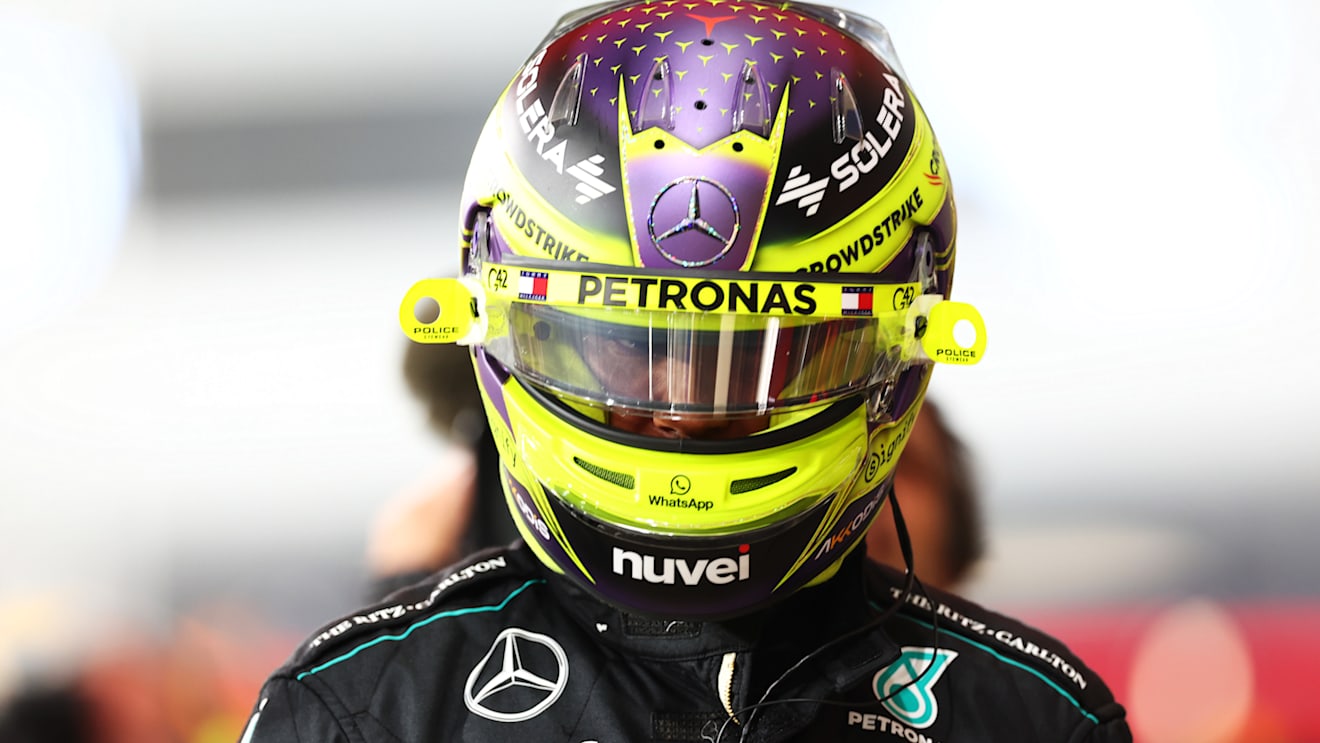 ABU DHABI, UNITED ARAB EMIRATES - DECEMBER 07: 18th placed qualifier Lewis Hamilton of Great Britain and Mercedes walks in the Pitlane during qualifying ahead of the F1 Grand Prix of Abu Dhabi at Yas Marina Circuit on December 07, 2024 in Abu Dhabi, United Arab Emirates. (Photo by Bryn Lennon - Formula 1/Formula 1 via Getty Images)