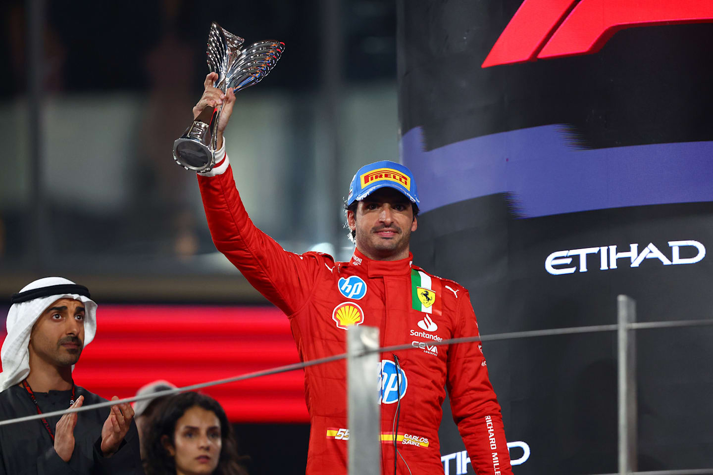 ABU DHABI, UNITED ARAB EMIRATES - DECEMBER 08: Second placed Carlos Sainz of Spain and Ferrari